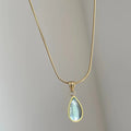 Retro water drop necklace in blue or green with titanium steel snake bone chain and mixed gem inlay for women