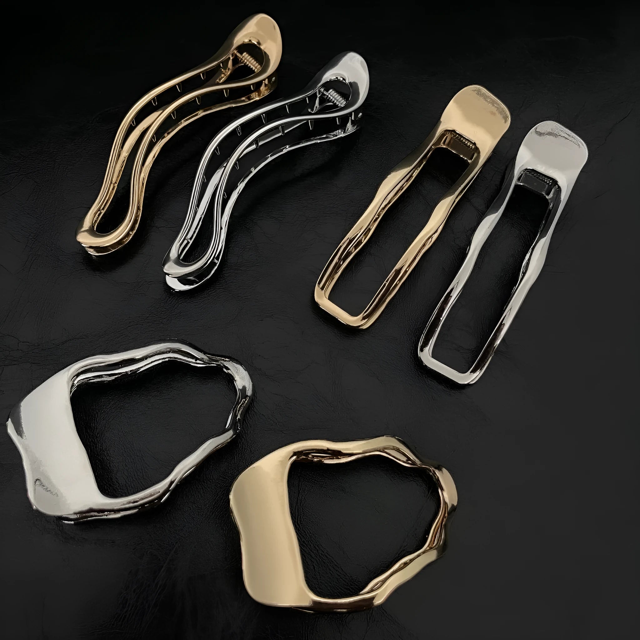 Gold and silver zinc alloy hair clips in arc, square, and triangle geometric shapes