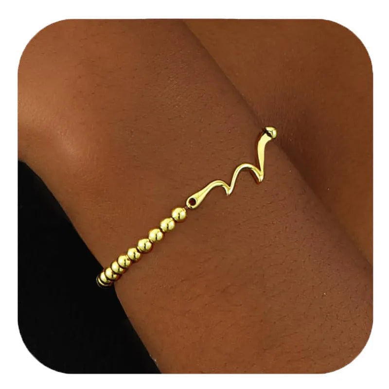 Adjustable stainless steel beaded bracelet with geometric design and round elements in electroplated finish