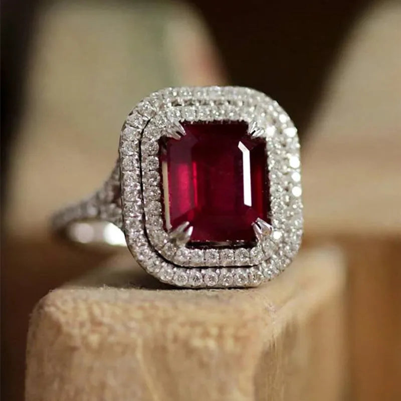 Copper square princess ring with rhinestone centre in F827 red colour, shown in geometric profile