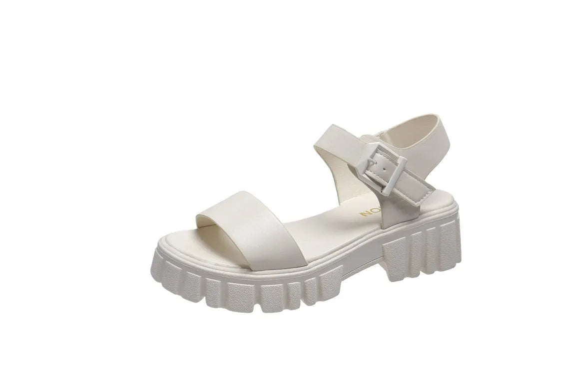 Women's beige peep toe platform sandals with ankle-strap buckle on foot