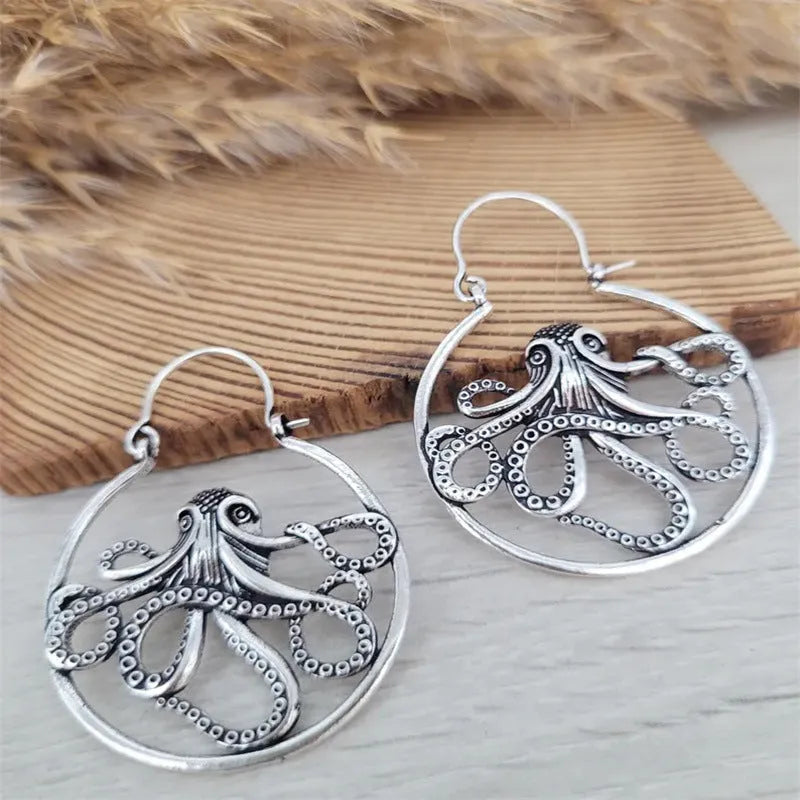 Vintage octopus earrings in antique silver finish with retro design details on zinc alloy