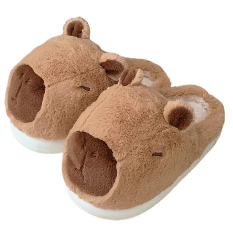 Cartoon Capabala cotton slippers with brown suede upper and round toe, shown on a light indoor floor