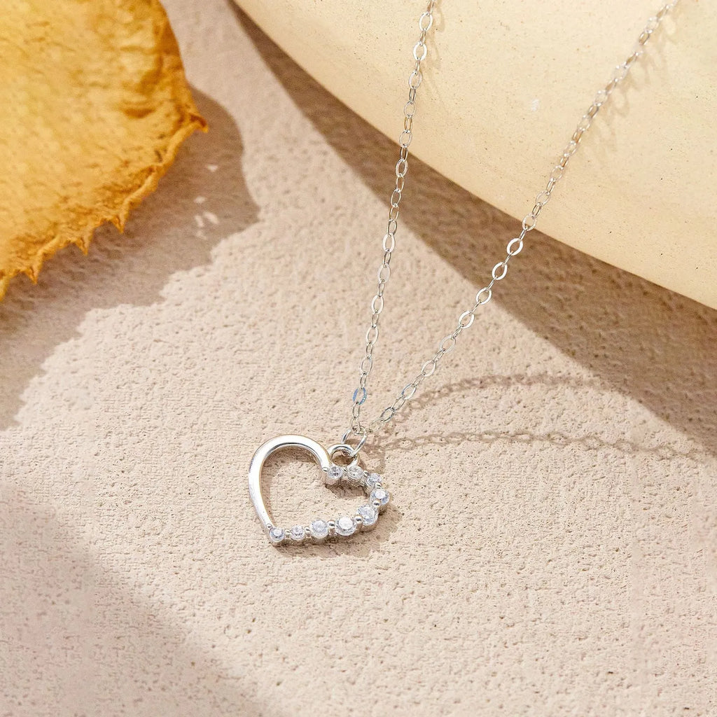 S925 sterling silver hollow heart necklace with gold plating options on regular chain