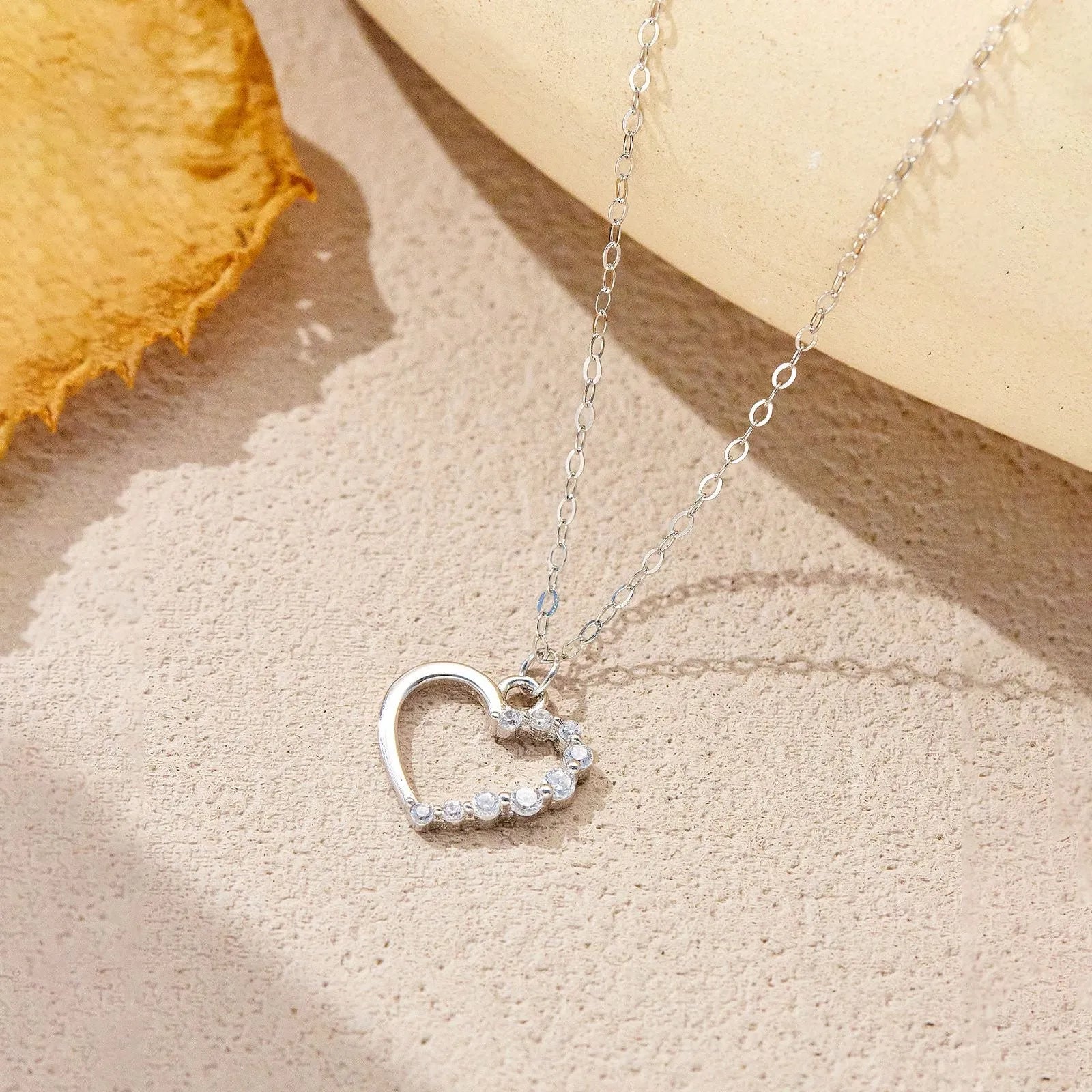 S925 sterling silver hollow heart necklace with gold plating options on regular chain