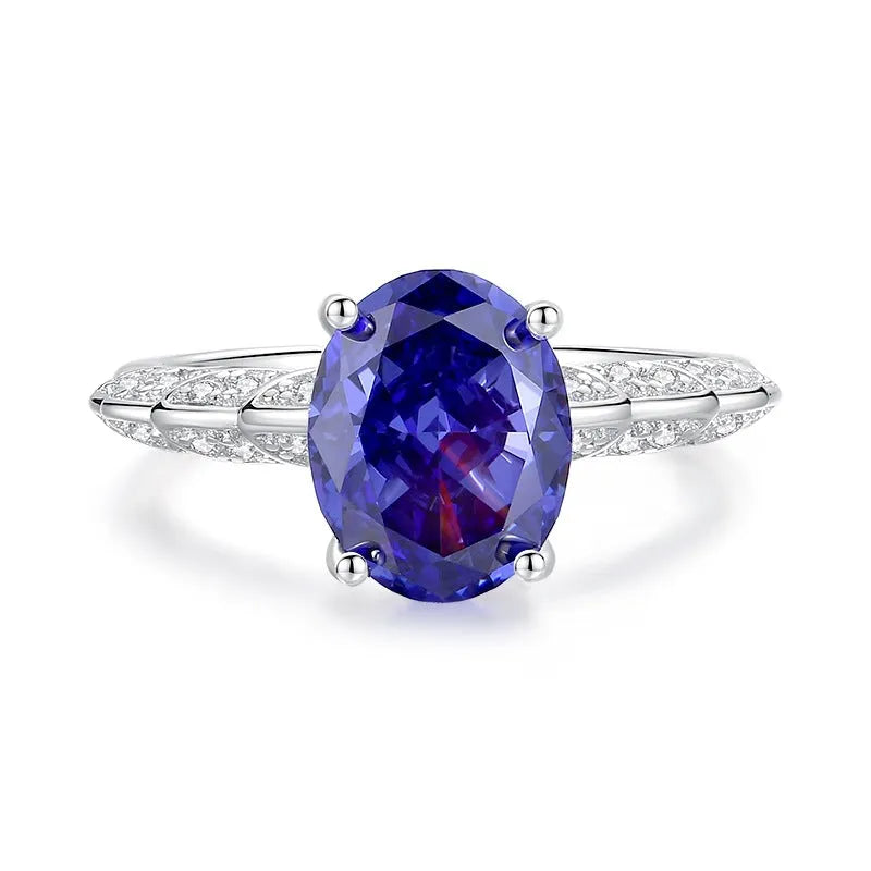 925 sterling silver ring with a heart-shaped Tanzanite colour zircon stone in an ice flower cut.