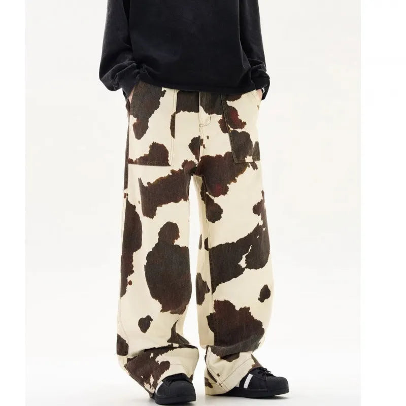 Men's straight-leg casual trousers with a retro cow pattern in a cotton blend fabric.