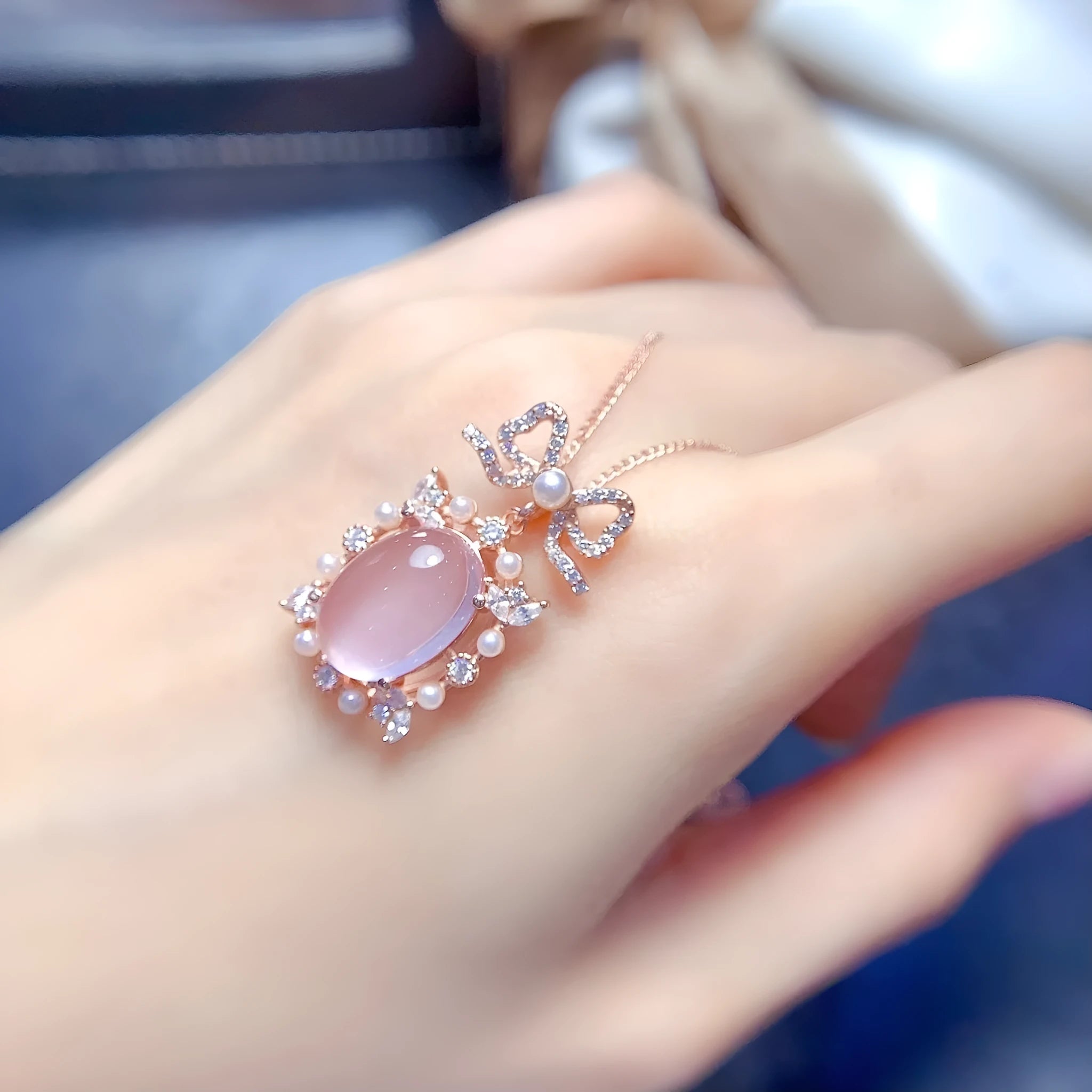 Geometric pink rose quartz pendant necklace with silver setting and rose gold plating on alloy chain