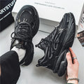 Men's beige mesh sneakers with round toe design and lace-up front fastening