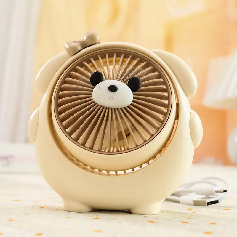 Desktop USB electric fan with cute dog design showing six colour options including bear brown and pink puppy variations