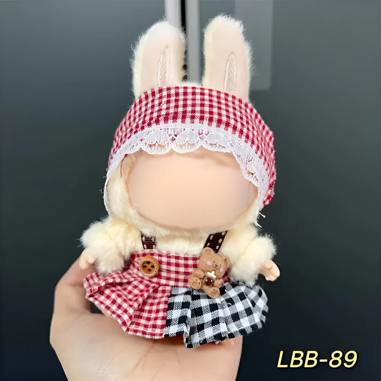 Plastic doll clothes costume for a 17cm tall vinyl figurine or action figure.