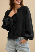 Women's solid colour sweater with a half-open collar featuring white stitching lace detail and long sleeves.