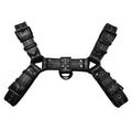 Black leather chest bondage strap with metal buckle and rivet details for adult costume use.