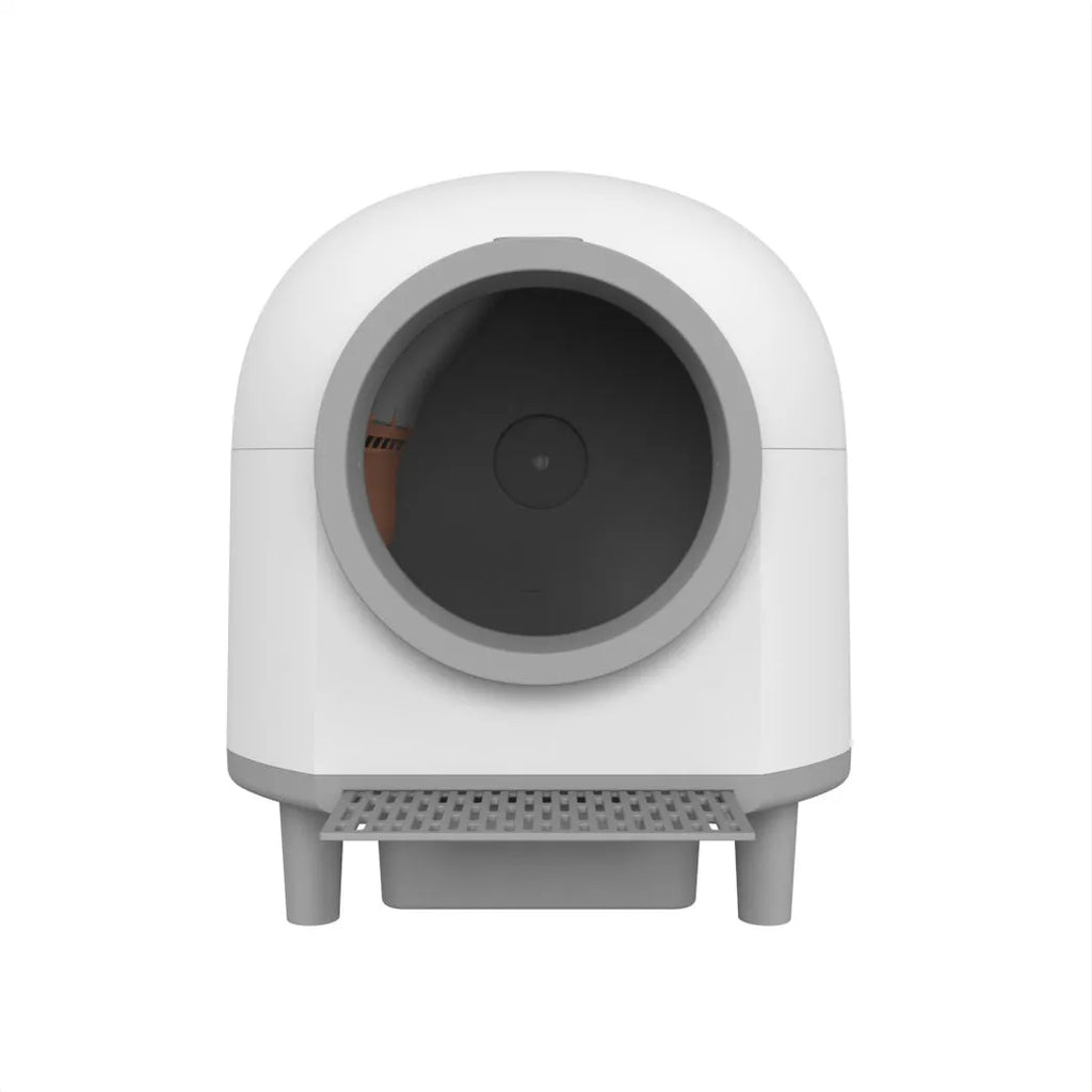 White automatic cat litter box with enclosed design measuring 556mm long by 512mm wide