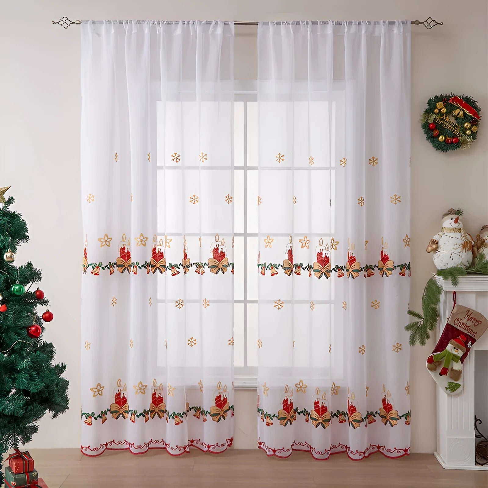 Pair of white Christmas curtains with detailed embroidered red and green snowflake design, showing texture and semi-sunshade fabric.
