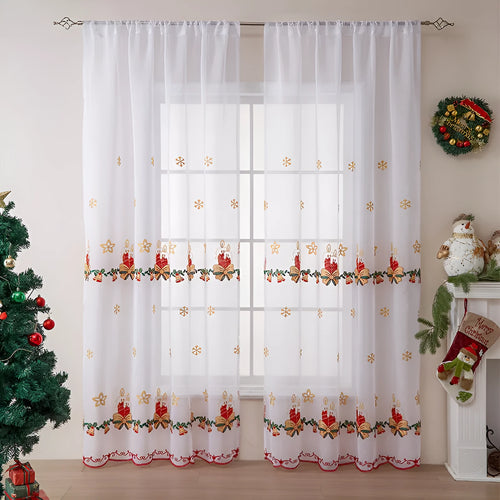 Pair of white Christmas curtains with detailed embroidered red and green snowflake design, showing texture and semi-sunshade fabric.