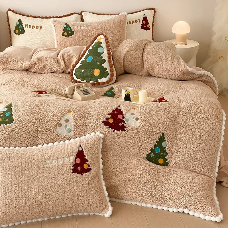 Bright yellow winter Christmas bedding four-piece set with cartoon pattern on a bed, showing fleece-lined quilt cover, sheet, and pillowcases.