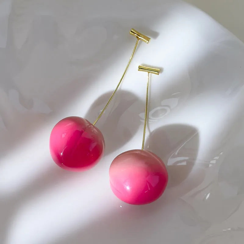 Women's acrylic peach fruit earrings in two colour styles with copper earring findings