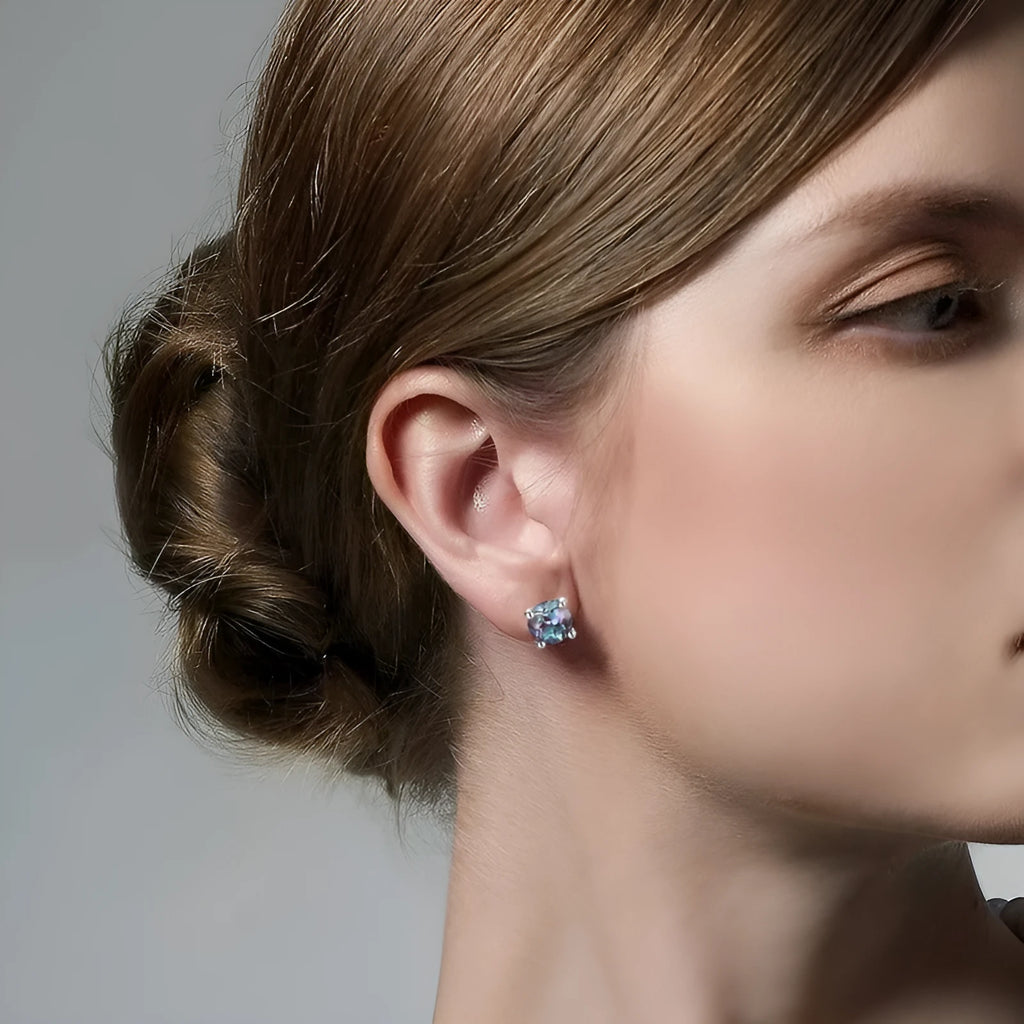Women's sterling silver ear studs with cultivated Alexandrite stone in geometric round design