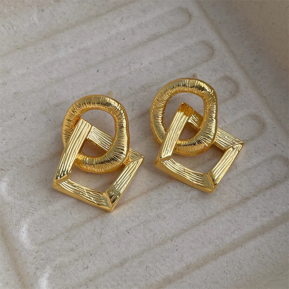 3.4cm copper circle pendant earrings with geometric design in gold or silver electroplated finish