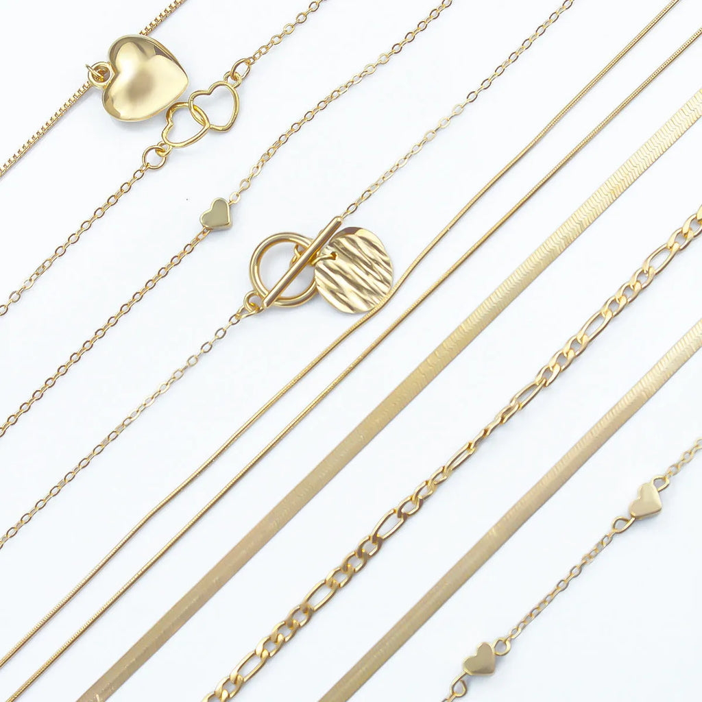 Gold necklace set with ten alloy pendants on adjustable snake bone chain
