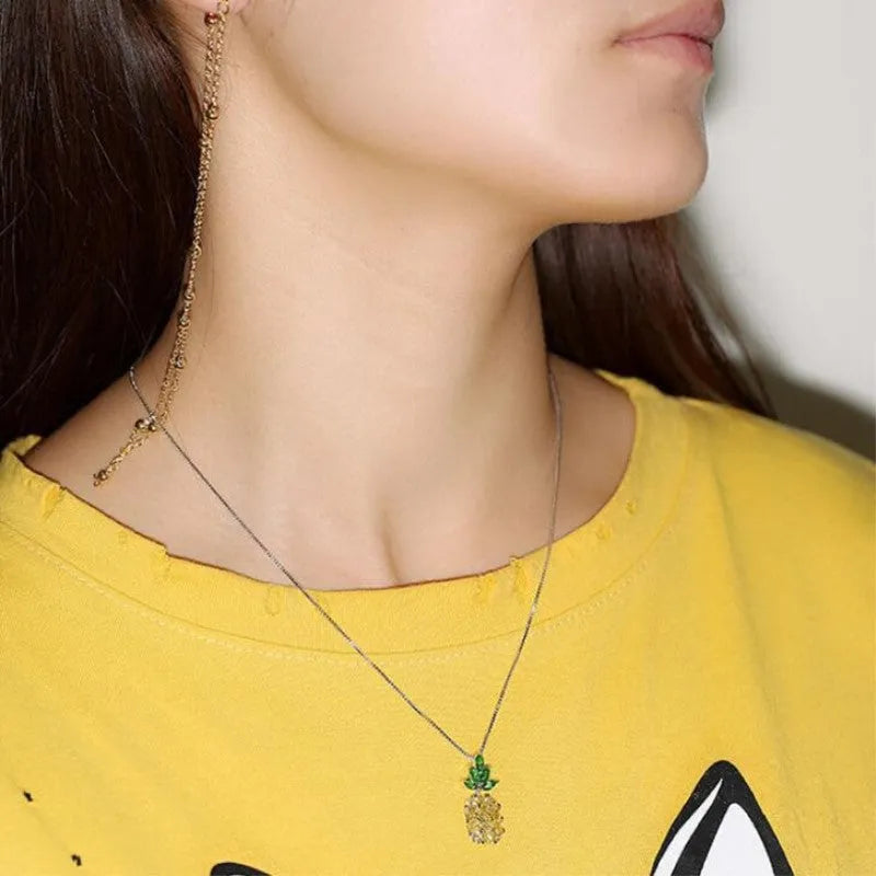 Silver Korean fashion necklace with pineapple and diamond pendant charms and geometric design
