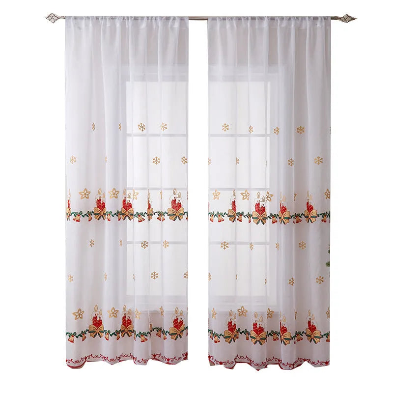 Pair of white Christmas curtains with detailed embroidered red and green snowflake design, showing texture and semi-sunshade fabric.