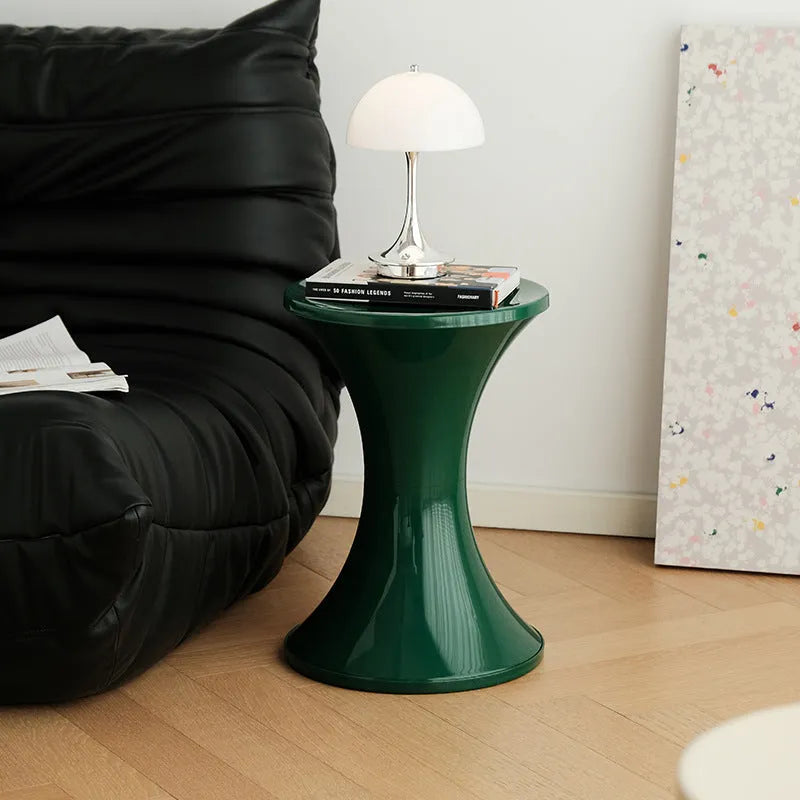 Plastic hourglass style shoe changing stool in available colours
