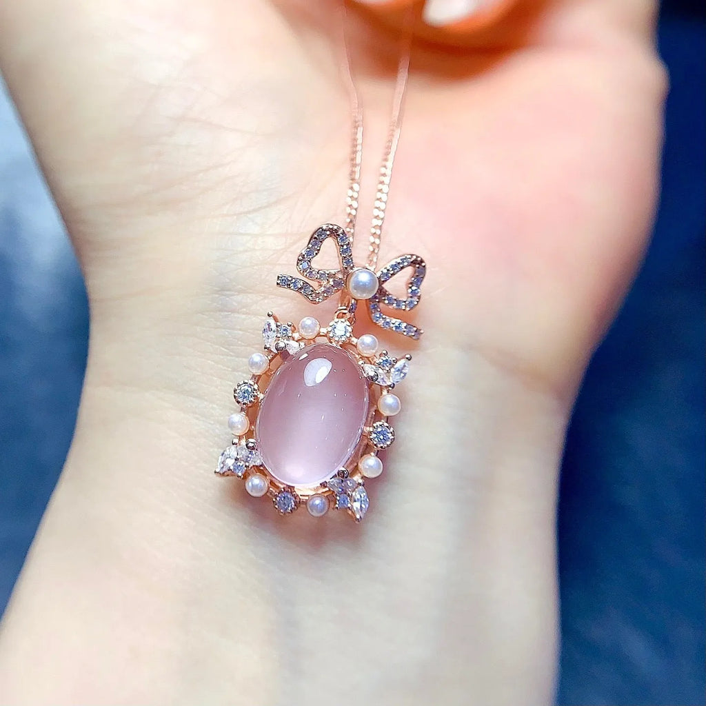 Geometric pink rose quartz pendant necklace with silver setting and rose gold plating on alloy chain