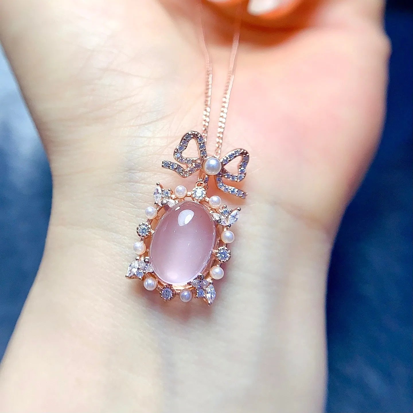 Geometric pink rose quartz pendant necklace with silver setting and rose gold plating on alloy chain