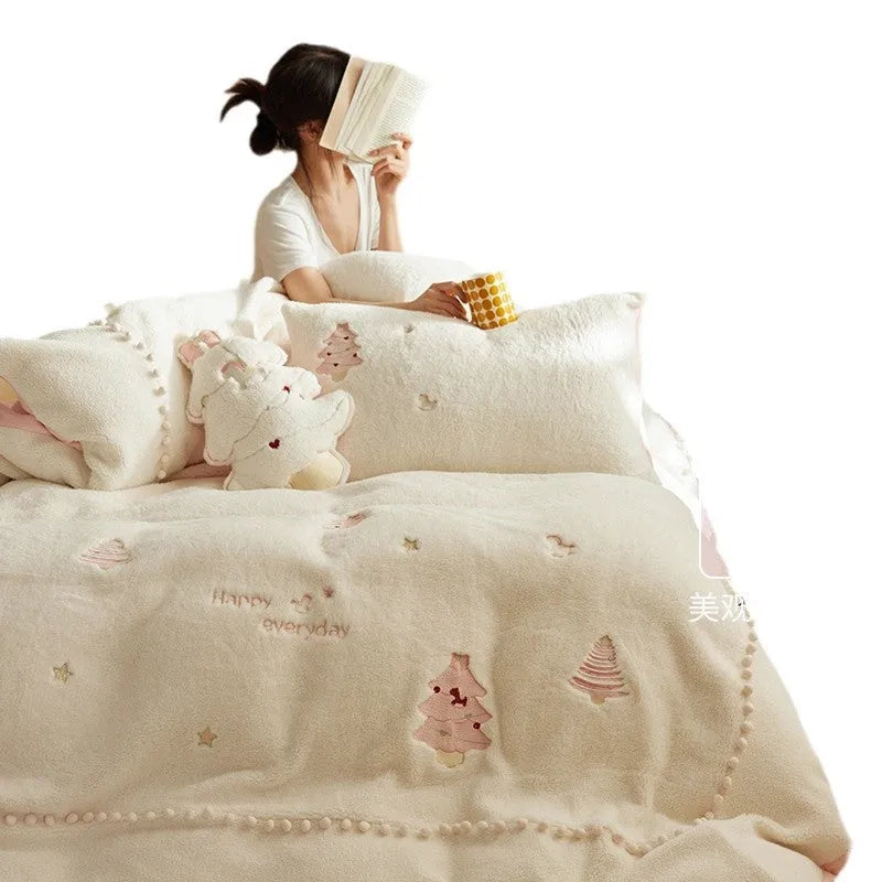 Milk fibre bedding four-piece set with green Christmas tree pattern on duvet cover, sheet, and pillowcases.