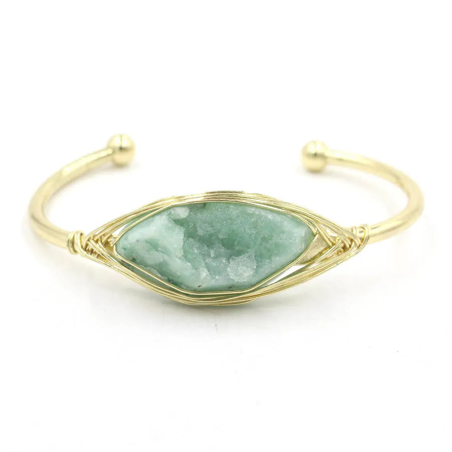 Natural raw gemstone crystal bracelet in ethnic style with simple opening, shown in one of nine colour options.