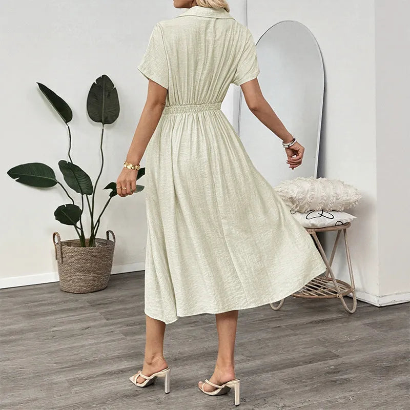 Light green commuter shirt dress with lapel collar and waist-tight fit