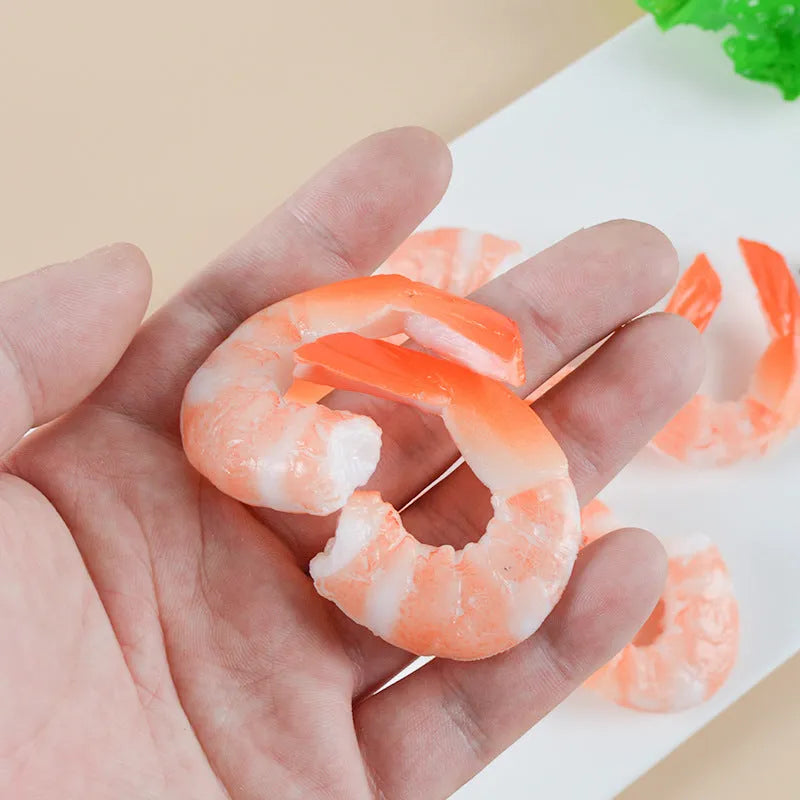 PVC injection moulded shrimp-shaped keychain with modern minimalist design