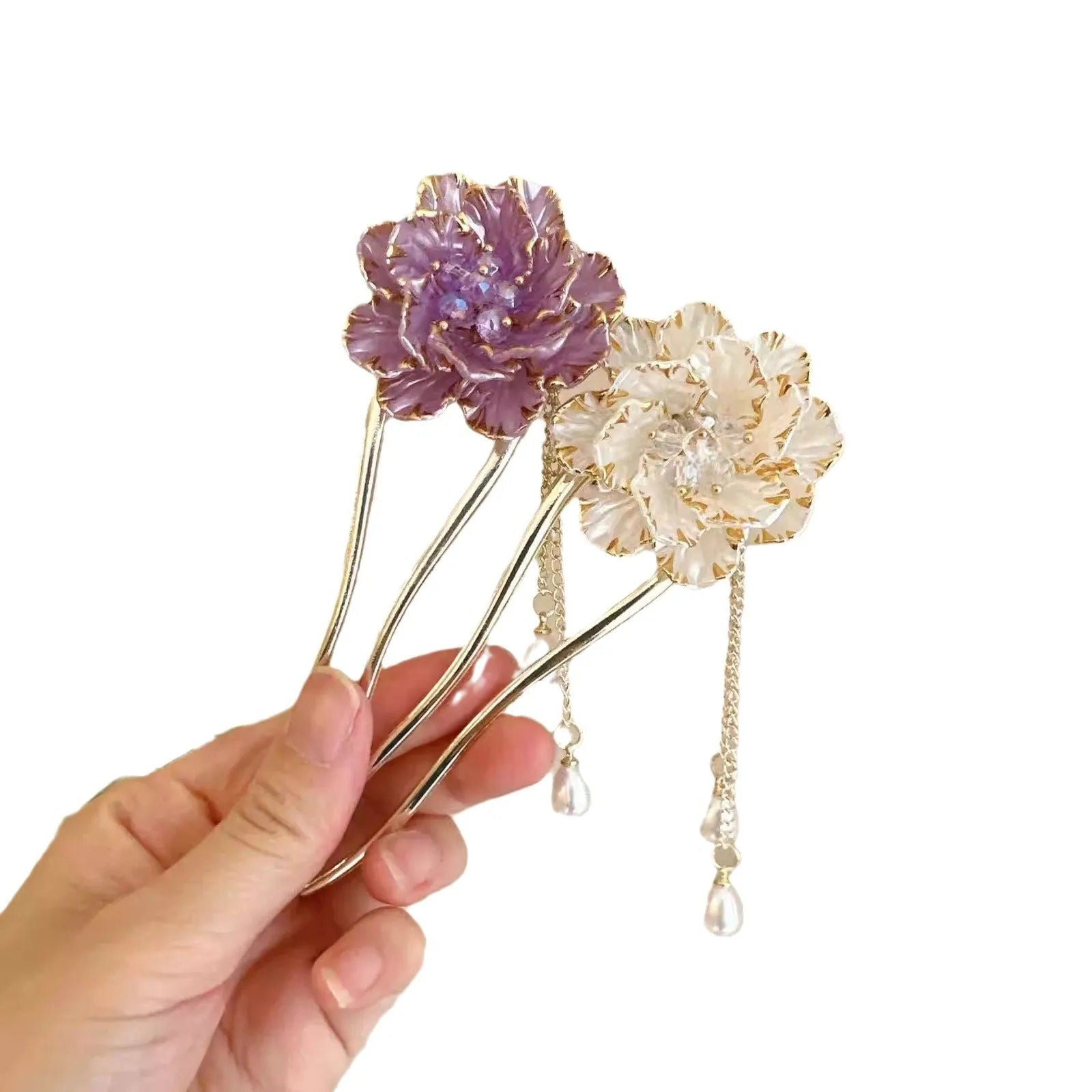 Close-up of a retro-style alloy U-shaped hairpin with a detailed purple peony flower and tassel design.