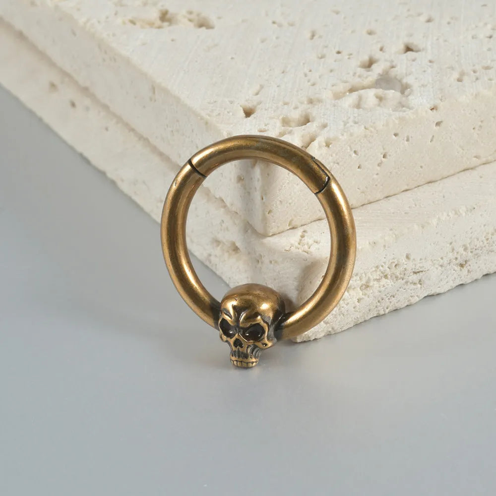 Copper punk earrings with ghost head design in antique gold or silver finish