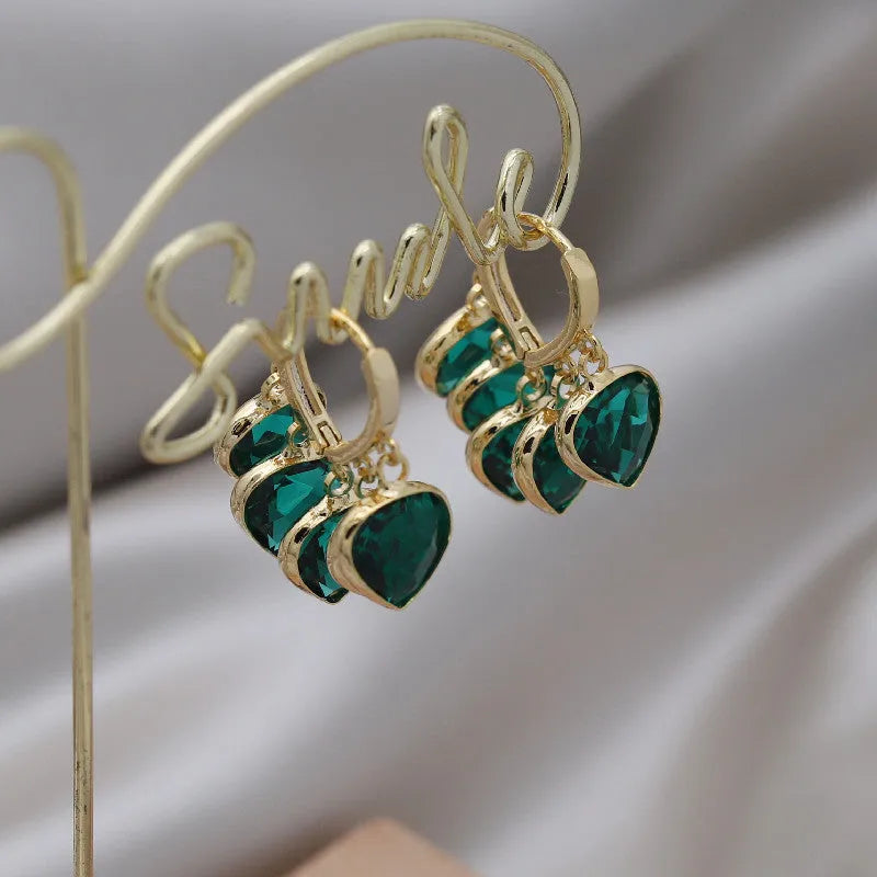Korean style green heart pendant glass ear clip earrings with alloy inlay artificial gemstone details