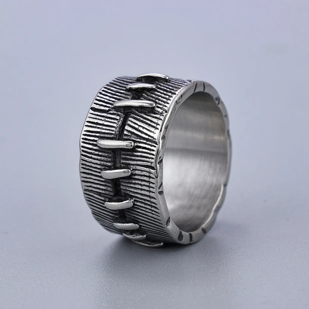 Titanium steel dark punk geometric U-shaped double ring in a retro colour on a size chart.