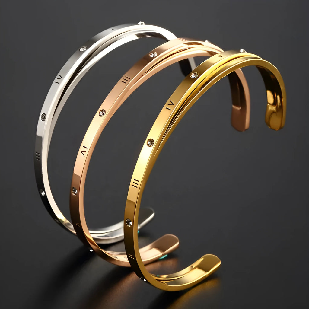 Open-ended adjustable bracelet with inlaid zircon detailing on love theme in rose gold steel colours