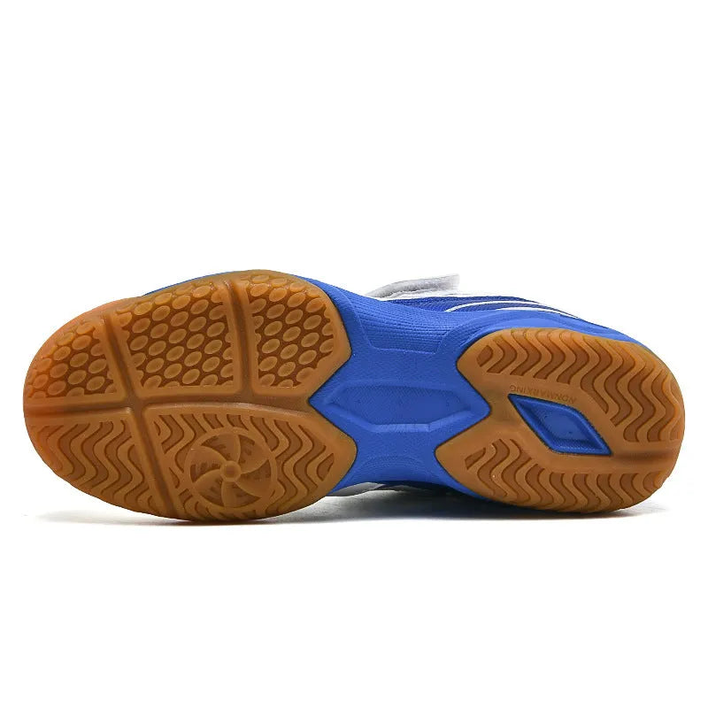White and blue lightweight badminton shoes with a low-top casual design and ribbed sole.