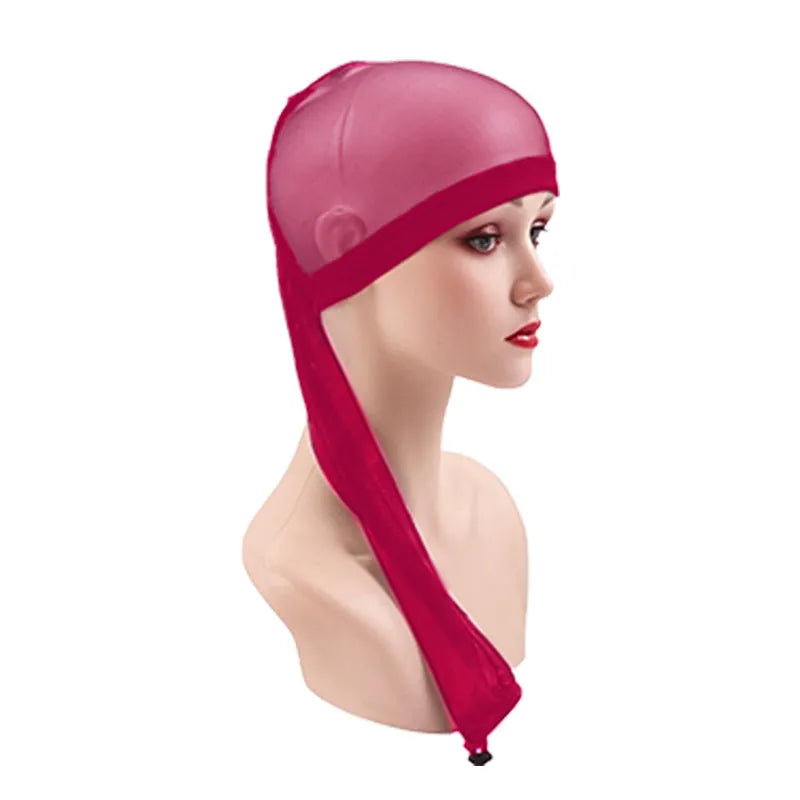 Mesh wig cap in spandex material showing stretch elasticity and breathable construction