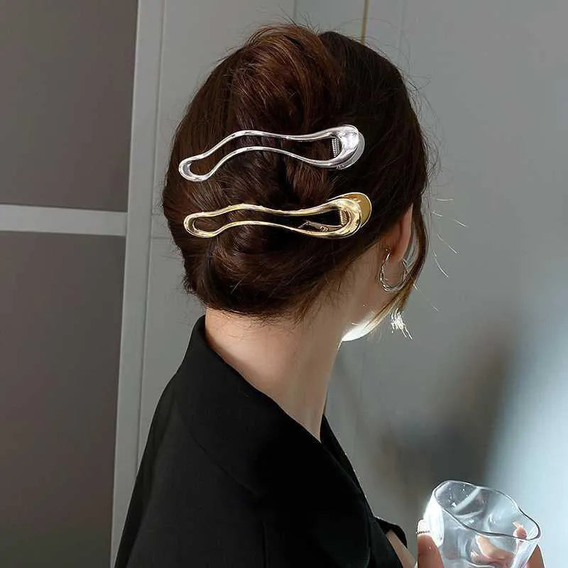 Gold and silver zinc alloy hair clips in arc, square, and triangle geometric shapes