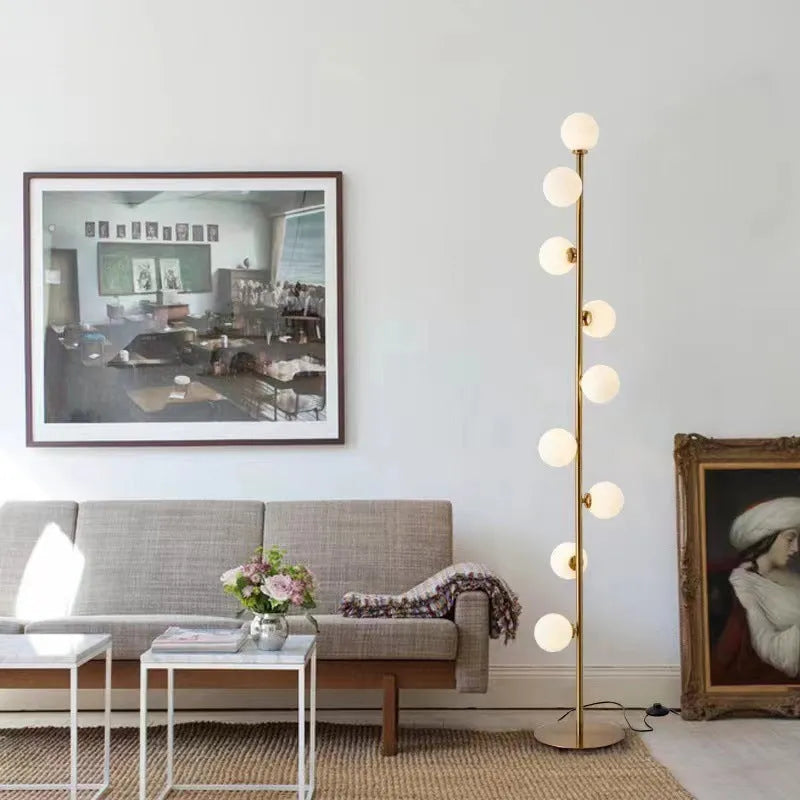 Modern minimalist floor lamp with wrought iron glass construction and adjustable lighting