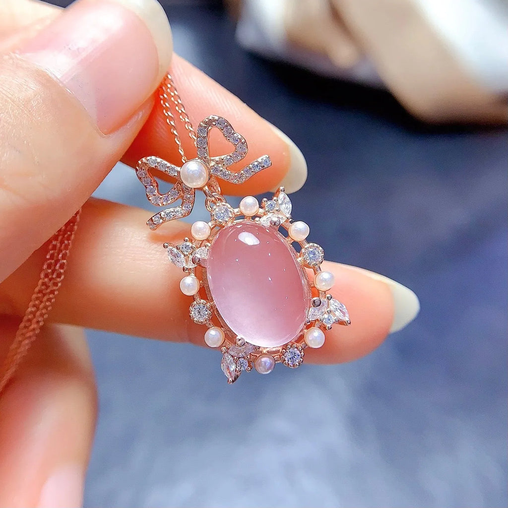 Geometric pink rose quartz pendant necklace with silver setting and rose gold plating on alloy chain