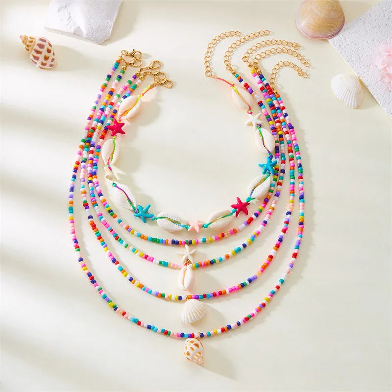 Blue and colour women's multi-layer necklace set with starfish shell conch pendants and bead elements