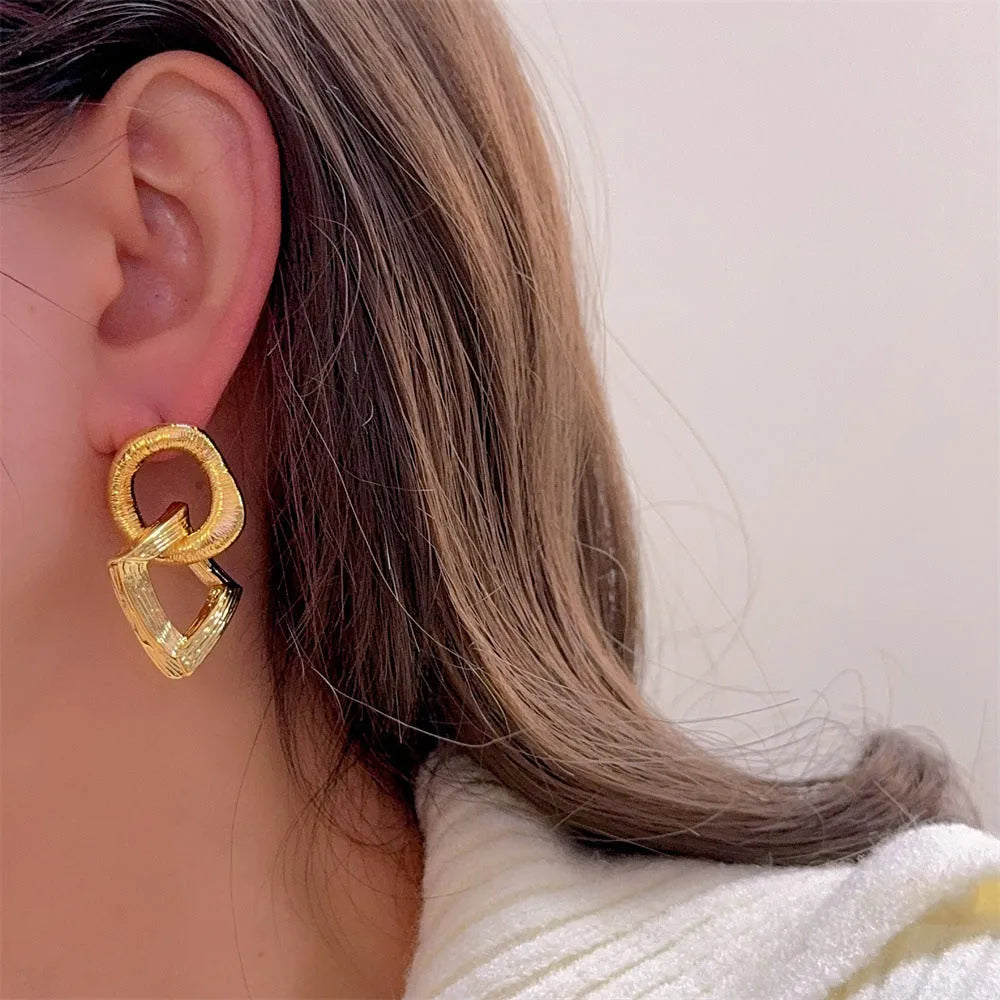 3.4cm copper circle pendant earrings with geometric design in gold or silver electroplated finish