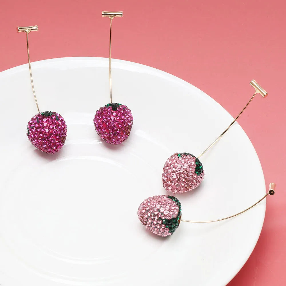 Women's geometric strawberry earrings with spot drill detail in red zinc alloy.