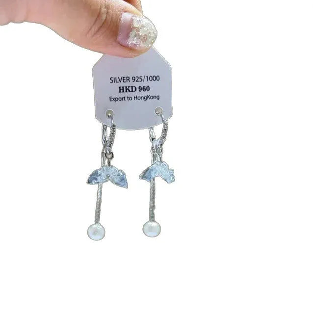 Geometric heart-shaped women's earrings with rhinestones and a silver tassel, shown on a white background.