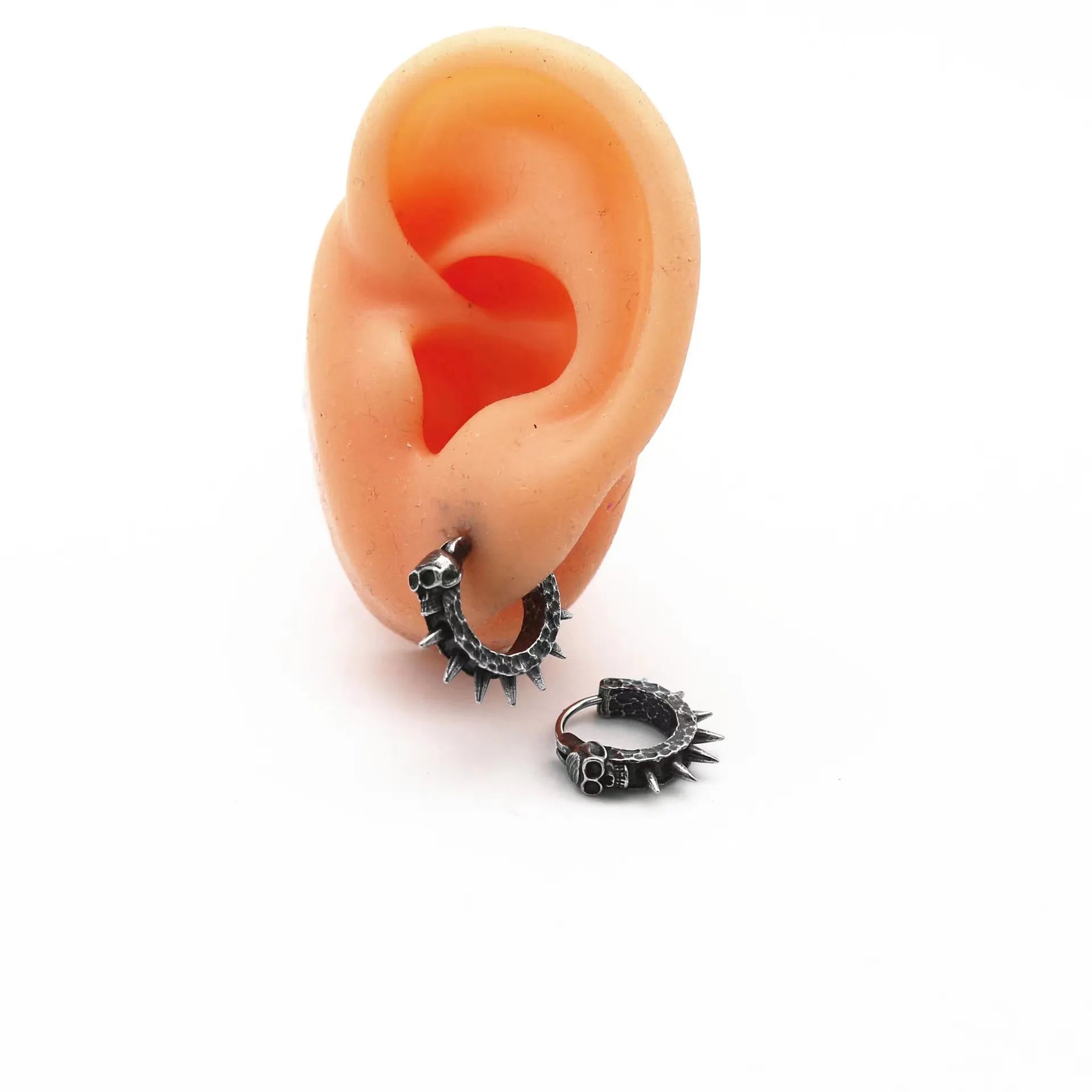 Geometric motorcycle punk earrings in retro black with copper accents and alloy construction