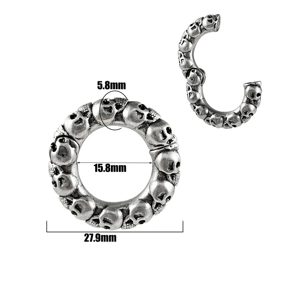 A pair of stainless steel totem pattern earrings with an electroplated finish, shown from the 15 available style options.